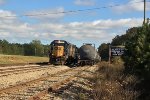 CSX 6147 and 2648 run light